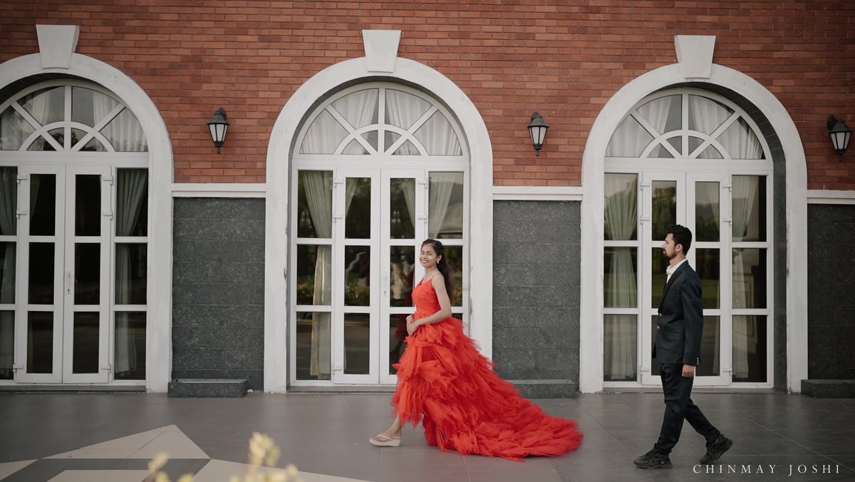 Bride in red at heritage arches